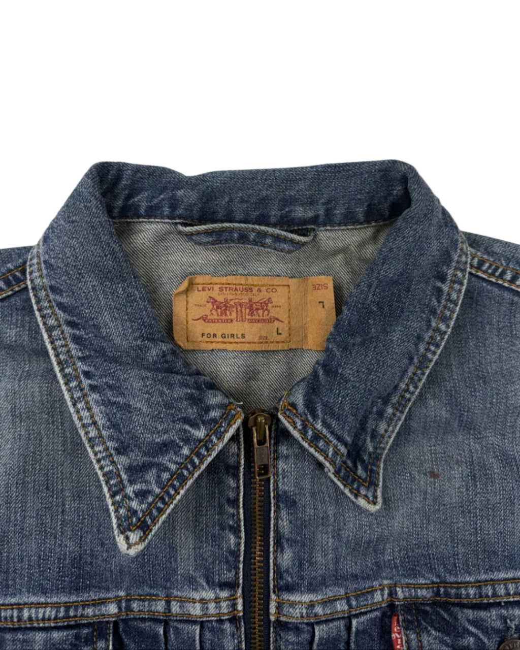 Vintage cropped Levi's denim jacket – detail view, small brown patch on front