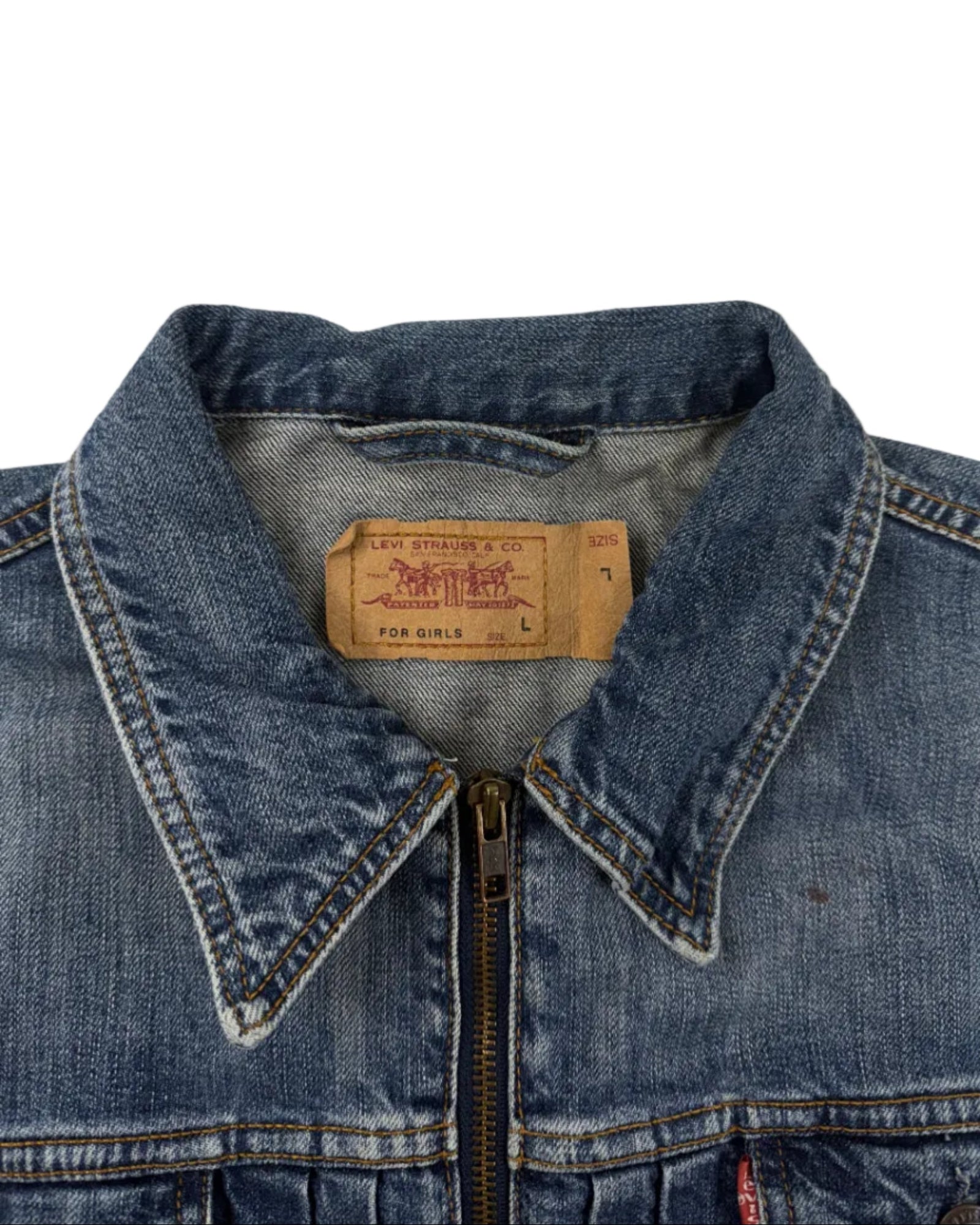Vintage cropped Levi's denim jacket – detail view, small brown patch on front