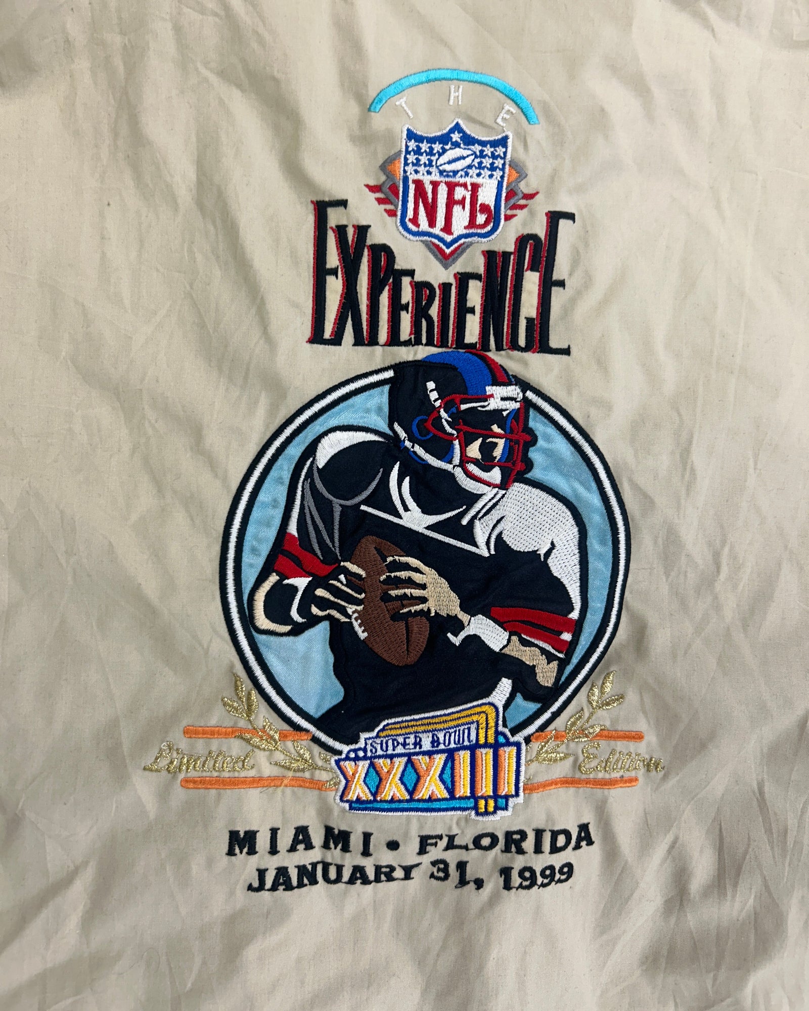 1999 NFL Experience Super Bowl XXXIII vintage windbreaker – label and material detail