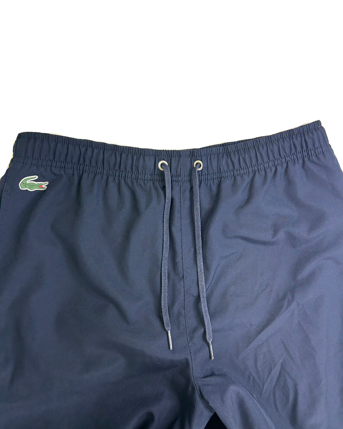 Vintage Lacoste track pants – front detail, size S